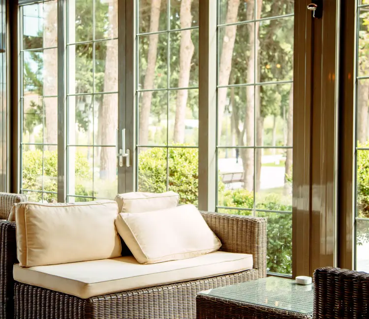 Inside the garage, Excel Detailing & Auto Care services a Ferrari with paint correction experts care.